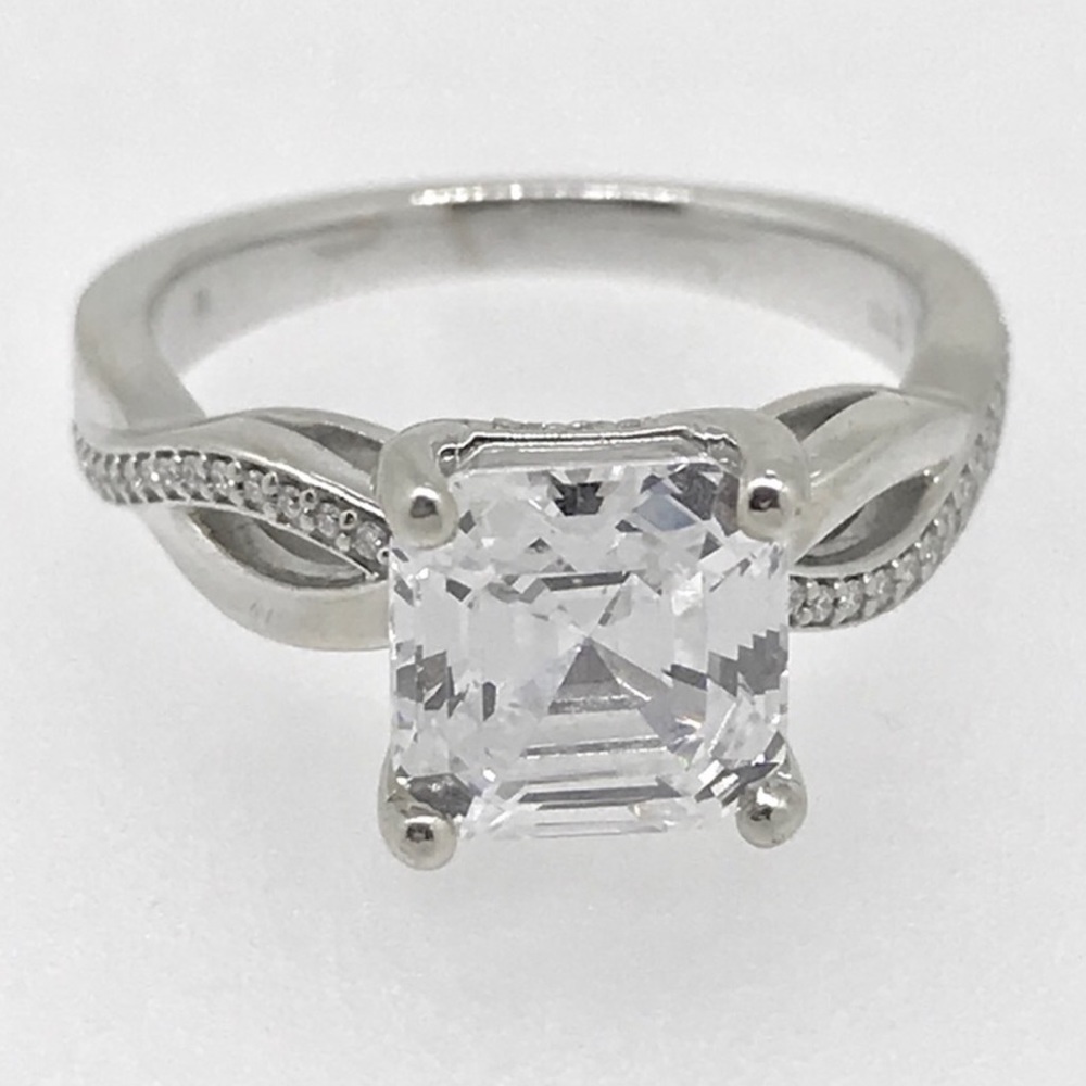 10k gold ring with 2 Carat cz and diamonds.